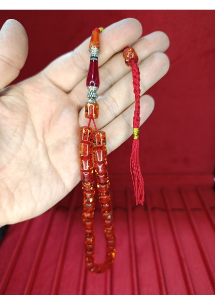 ÇUBUK KEHRİBAR TESBİH SİMLİ NECEF KAPSÜL KESİM KIRMIZI 10MMX8,5MM T-811