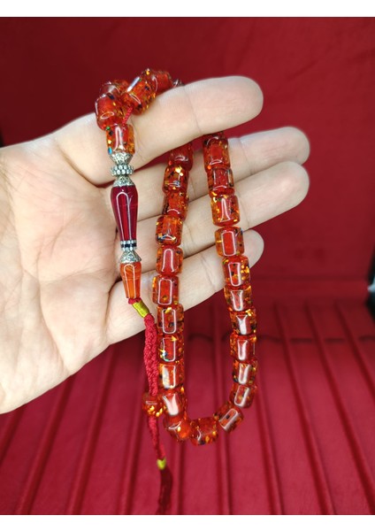 ÇUBUK KEHRİBAR TESBİH SİMLİ NECEF KAPSÜL KESİM KIRMIZI 10MMX8,5MM T-811 modelleri