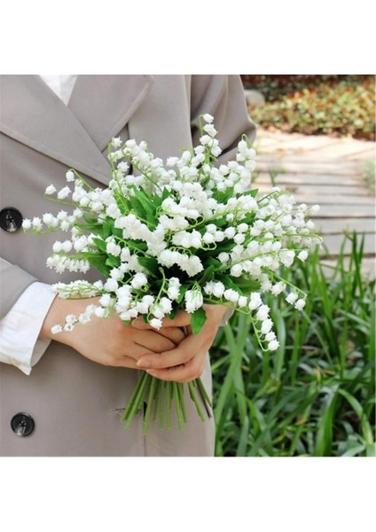 Beyaz yapay çiçek demeti, zarif ve şık dekoratif seçim, doğal görünüm. modelleri