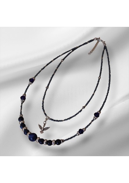 Anka Kuşu Figürlü Kadın Kolye – İki Parçalı, Mavi Boncuklu, Klips Kapamalı Şık Tasarım fırsatları