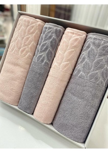 Gri-pudra 4'lü pamuklu banyo havlu takımı, yumuşak ve şık kullanım sağlar. fiyatları