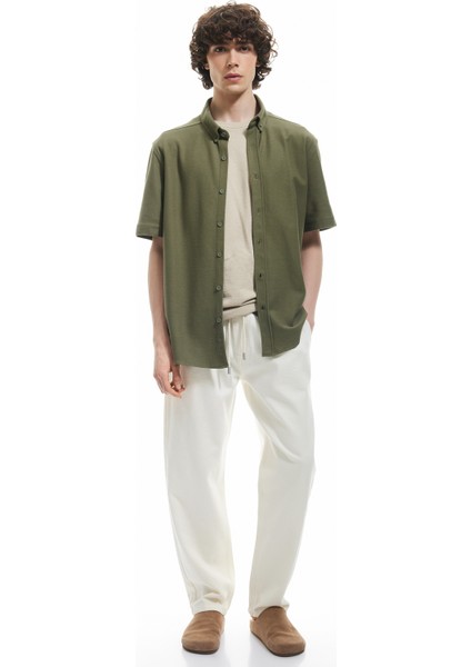 Pamuklu Regular Fit Düğmeli Yaka Kısa Kollu Gömlek fiyatları