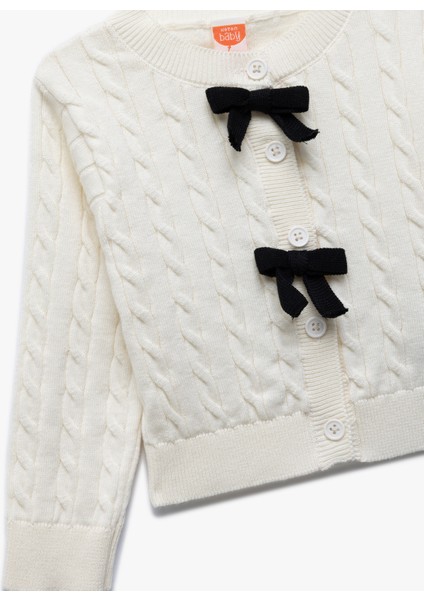 Uzun Kollu Bisiklet Yaka Fiyonk Detaylı Saç Örgü Triko Hırka modelleri