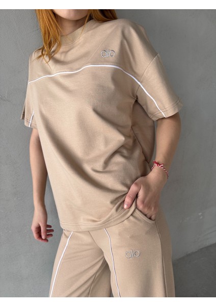 TKM-03653 Bej Rengi Muadil Kumaş Bisiklet Yaka Tshirt Bel Lastikli Palazzo Alt Biyeli Ikili Takım modelleri