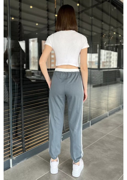 Bel ve Paça Lastikli Yan Şeritli Kadın Eşofman Altı modelleri
