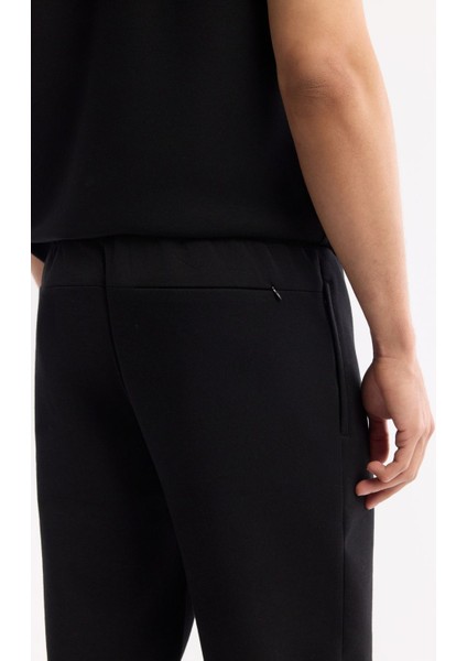 Erkek Siyah Beli Lastikli Bağcıklı Bi-Stretch Regular Fit Eşofman Altı A51Y3412 indirimleri