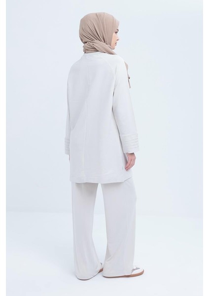 Taş-Manşeti Nervür Detaylı Yırtmaçlı Tunik fırsatları