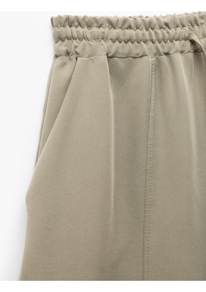 Modal Kumaş Beli Lastikli Bağlamalı Cepli Balon Fit Pantolon