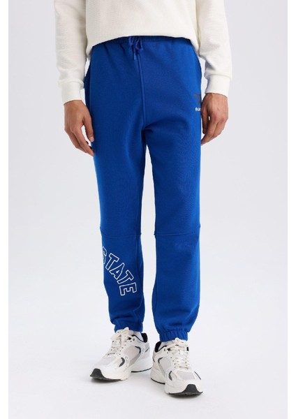 DeFactoFit Kalın Jogger Eşofman Altı NBA Golden State Warriors Standart Fit Beli Bağcıklı Cepli D3221AX24WN
