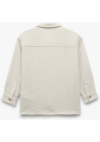 Uzun Kollu Düğmeli Klasik Yaka Cep Detaylı Etiket Baskılı Gömlek fiyatları