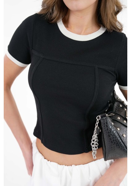 Siyah Yaka ve Kol Garni Detaylı Biyeli Fitilli Örme Crop Bluz fırsatları