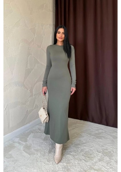 Haki Vücudu Saran Uzun Elbise