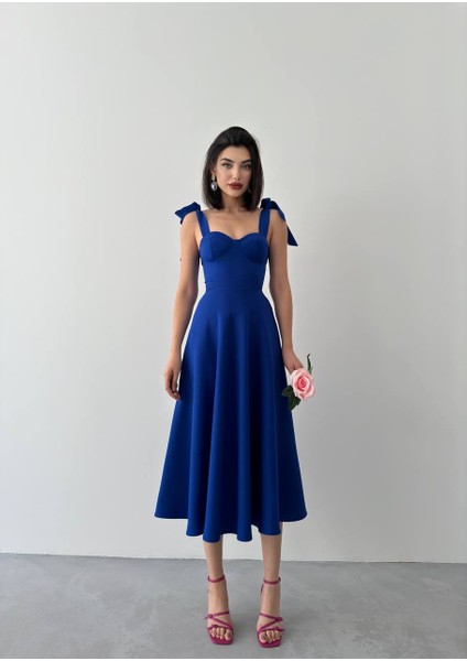 Kalp Yaka Fiyonk Askılı Kloş Midi Elbise indirimleri