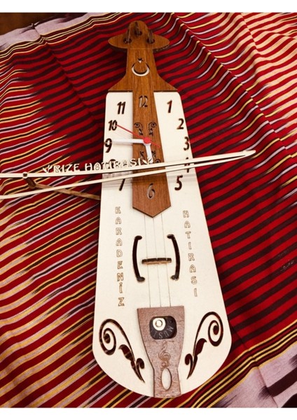 Üçüzler Tekstilsaat Başı Kemençe Çalan Saat
