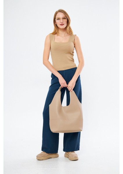 Kare Yaka Atlet indirimleri