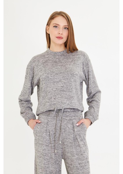 Beli Kuş Gözlü Triko Bluz