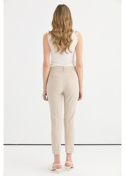 Paçası Fermuarlı Arkası Uzun Pantolon indirimleri