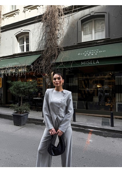 Kadın Poliviskon Asimetrik Düğmeli Vatkalı Ceket Pantolon Takım modelleri