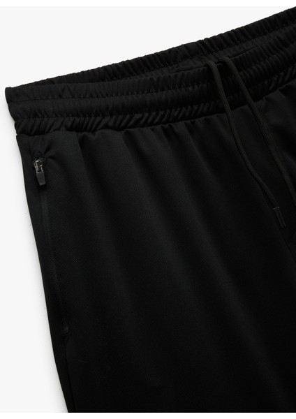 Beli Lastikli Bermuda Fermuarlı Cep Detaylı Oversize Erkek Spor Şort