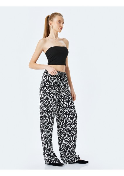 Etnik Desenli Beli Bağcıklı Viskon Geniş Paça Pantolon fiyatları