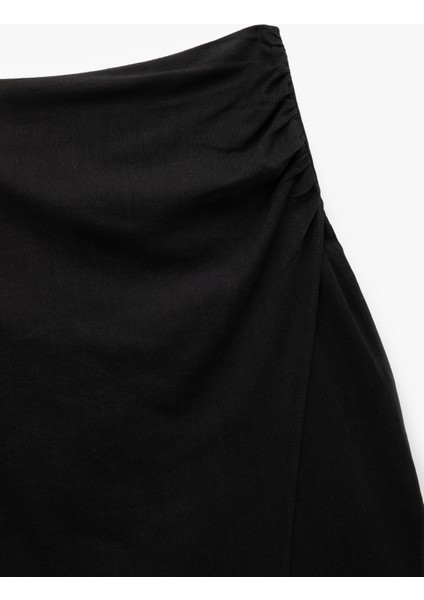 Asimetrik Kesim Drapeli Yırtmaçlı Midi Kalem Etek modelleri