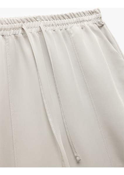 Modal Kumaş Beli Lastikli Bağlamalı Cepli Balon Fit Pantolon modelleri