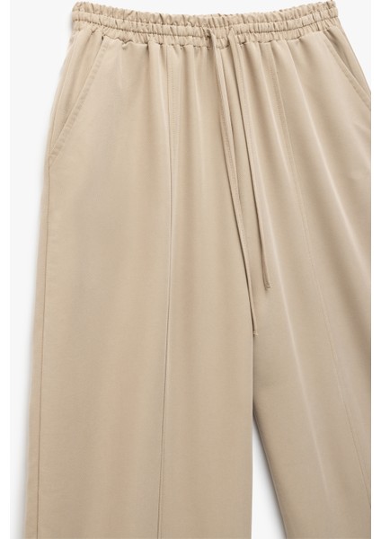 Modal Kumaş Beli Bağcıklı Cepli Balon Fit Pantolon indirimleri