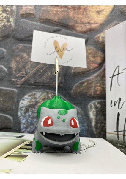 Bulbasaur Figürlü Not ve Fotoğraf Tutucu - Pokemon Temalı Masaüstü Aksesuarı Metal Kıskaç Notluk indirimleri