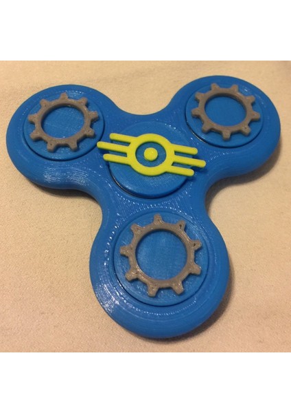 Fidget Tri-Spinner With Themed Bearing Caps