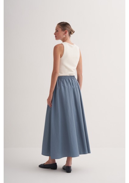 Mavi Beli Lastikli Pamuklu Volanlı Geniş Kesim Etek fırsatları