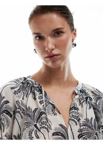 Floral Desenli Viskon Bağlamalı Yuvarlak Yaka Uzun Kollu Bluz fiyatları