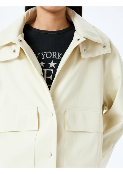 Kapüşonlu Cepli Su Itici Fermuarlı Trençkot indirimleri