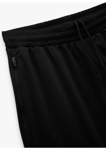 Beli Lastikli Bermuda Fermuarlı Cep Detaylı Oversize Erkek Spor Şort modelleri