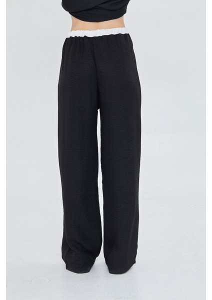 Beli Garnili Bağcıklı Keten Görünümlü Pantolon modelleri