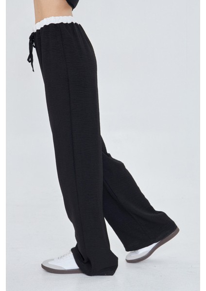 Beli Garnili Bağcıklı Keten Görünümlü Pantolon fırsatları