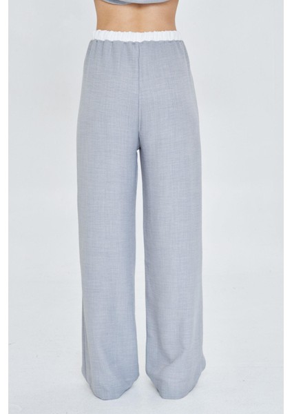 Beli Garnili Bağcıklı Keten Görünümlü Pantolon modelleri