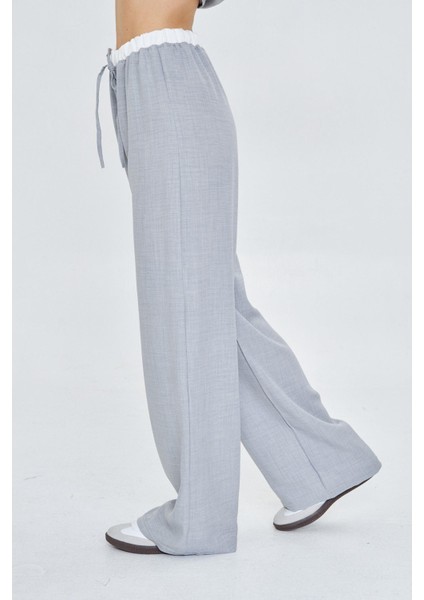 Beli Garnili Bağcıklı Keten Görünümlü Pantolon fırsatları