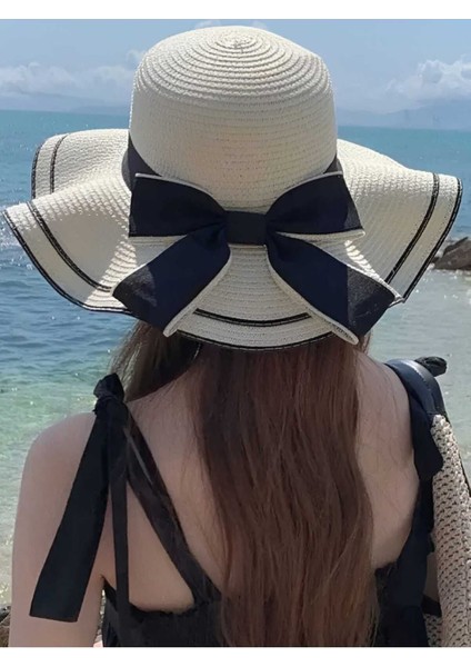 Kadın Dalgalı Geniş Siperli Fiyonklu Yazlık Organik Hasır Şapka modelleri