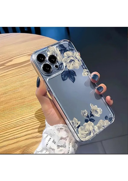 Mavi Çiçekli Şeffaf Apple iPhone 16 Telefon Kılıfı