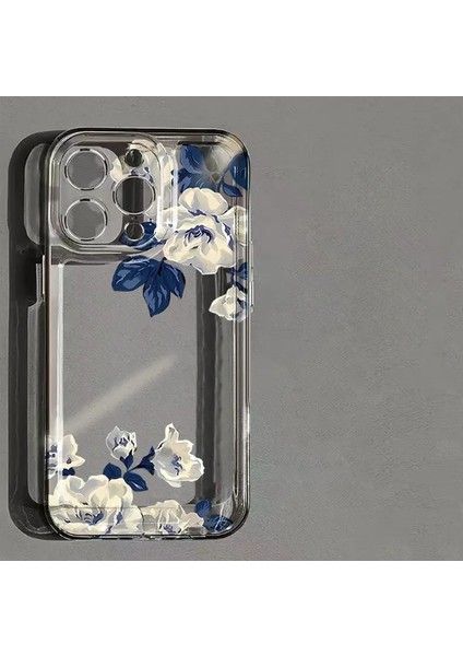 Mavi Çiçekli Şeffaf Apple iPhone 16 Telefon Kılıfı