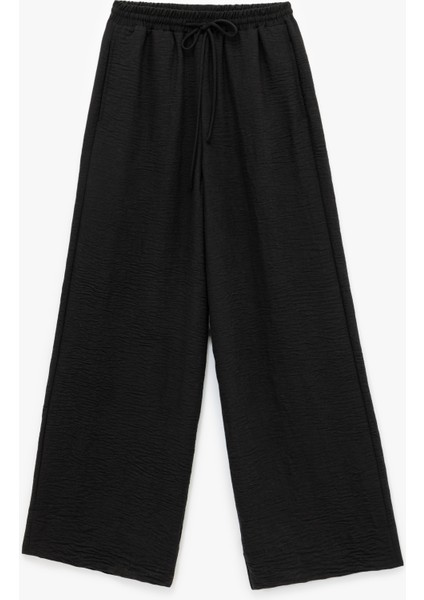Beli Bağlamalı Lastikli Cepli Rahat Kesim Geniş Paça Pantolon