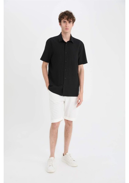 Regular Fit Polo Yaka Krinkıl Yazlık Kısa Kollu Siyah Gömlek E1223AX25SM fiyatları