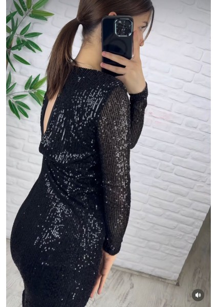 Elbise