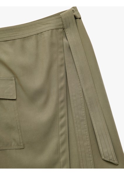 Cupro Kumaş Asimetrik Kesim Kemerli Kargo Cepli Uzun Kruvaze Etek modelleri