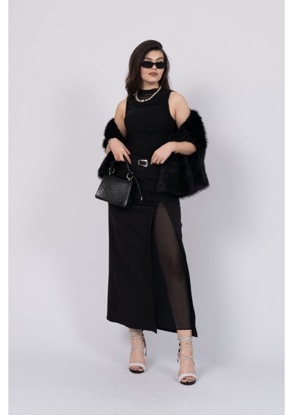 Kalem Etek Formu, Derin Yırtmacı ve Tül Detaylı Kapamasıyla Bakışları Üzerinde Toplayan Etek 6773 fiyatları