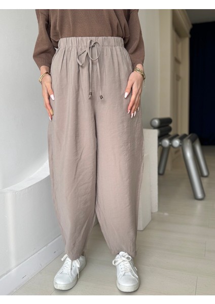 Bej Beli Lastikli Paça Detaylı Cepli Pantolon