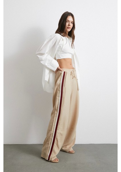 Beli Lastikli Çift Şeritli Pantolon Bej fiyatları