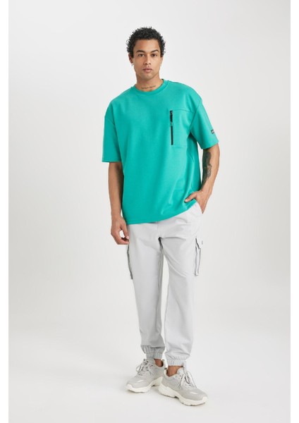 Fit Sporcu Jogger Eşofman Altı Standart Fit Kargo Cepli Dokuma Beli Paçası Lastikli C0043AX24SP