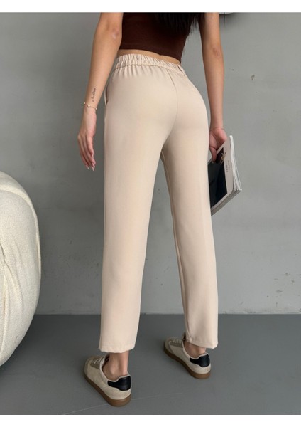 Kadın Yüksek Bel Lastikli Havuç Kesim Pensli Kumaş Pantolon fırsatları