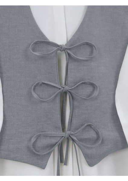 Yeleği Bağcıklı Bol Paça Pantolonlu İkili Keten Takım(Ürüne Gömlek Dahil Değildir) modelleri